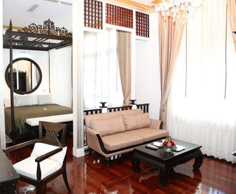 Jing Land Hotel Λουάνγκ Πραμπάνγκ Δωμάτιο φωτογραφία